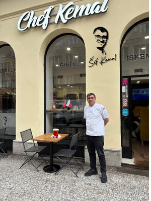 Glass of traditional Turkish tea outside Šef Kemal restaurant in Prague